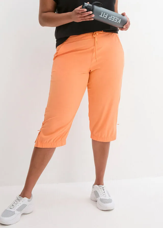 Pantalón funcional de largo capri y secado rápido Naranja claro