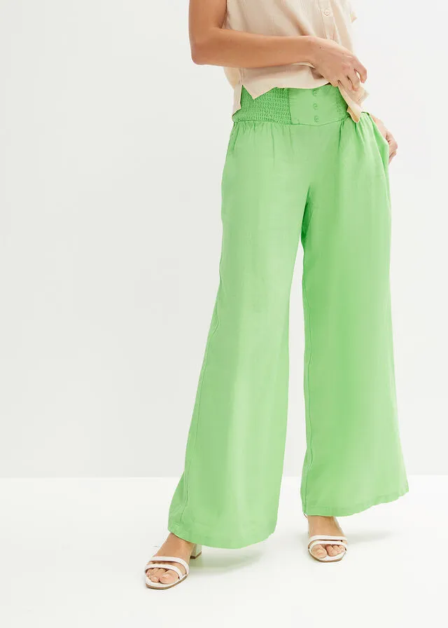 Pantalón Marlene de lino con talle alto y una cómoda cinturilla de nido de abeja Verde apio