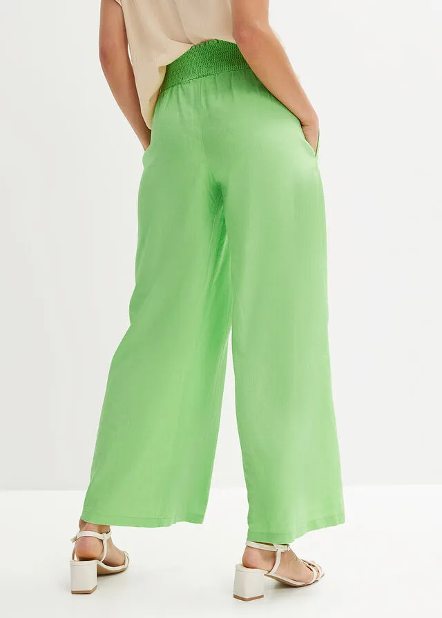 Pantalón Marlene de lino con talle alto y una cómoda cinturilla de nido de abeja Verde apio